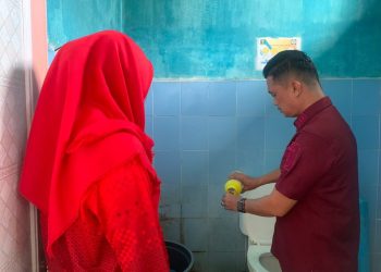 Pencegahan DBD di Rutan Sukadana: Penaburan Abate dan Sosialisasi Kebersihan
